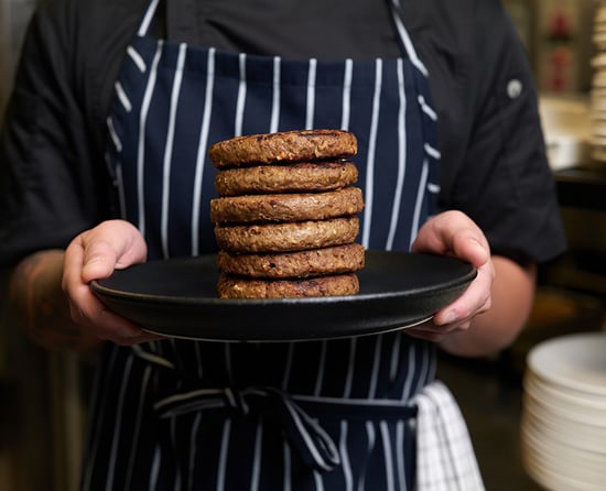 Patties stacked on a plate