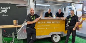 Angel Bay staff inside and next to the Angel Bay trailer